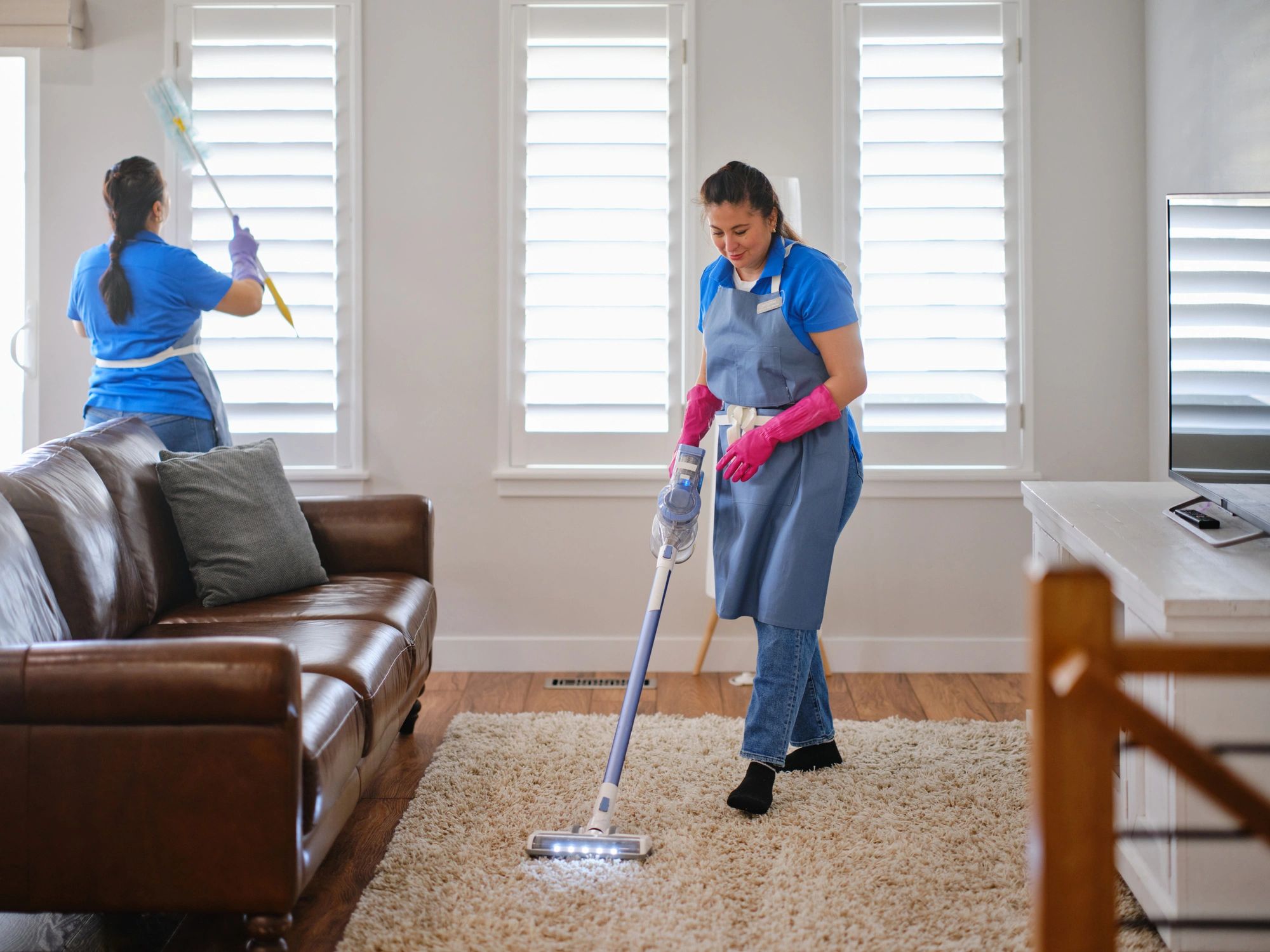 Reset & Shine Cleaning team at work in a modern kitchen
